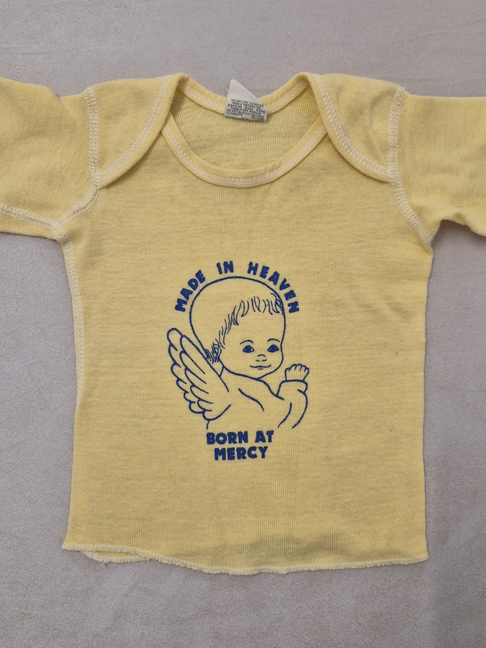 Vtg Junior StarsYellow Baby Tee Blue Angel Born At Mercy Graphic 12m Retro